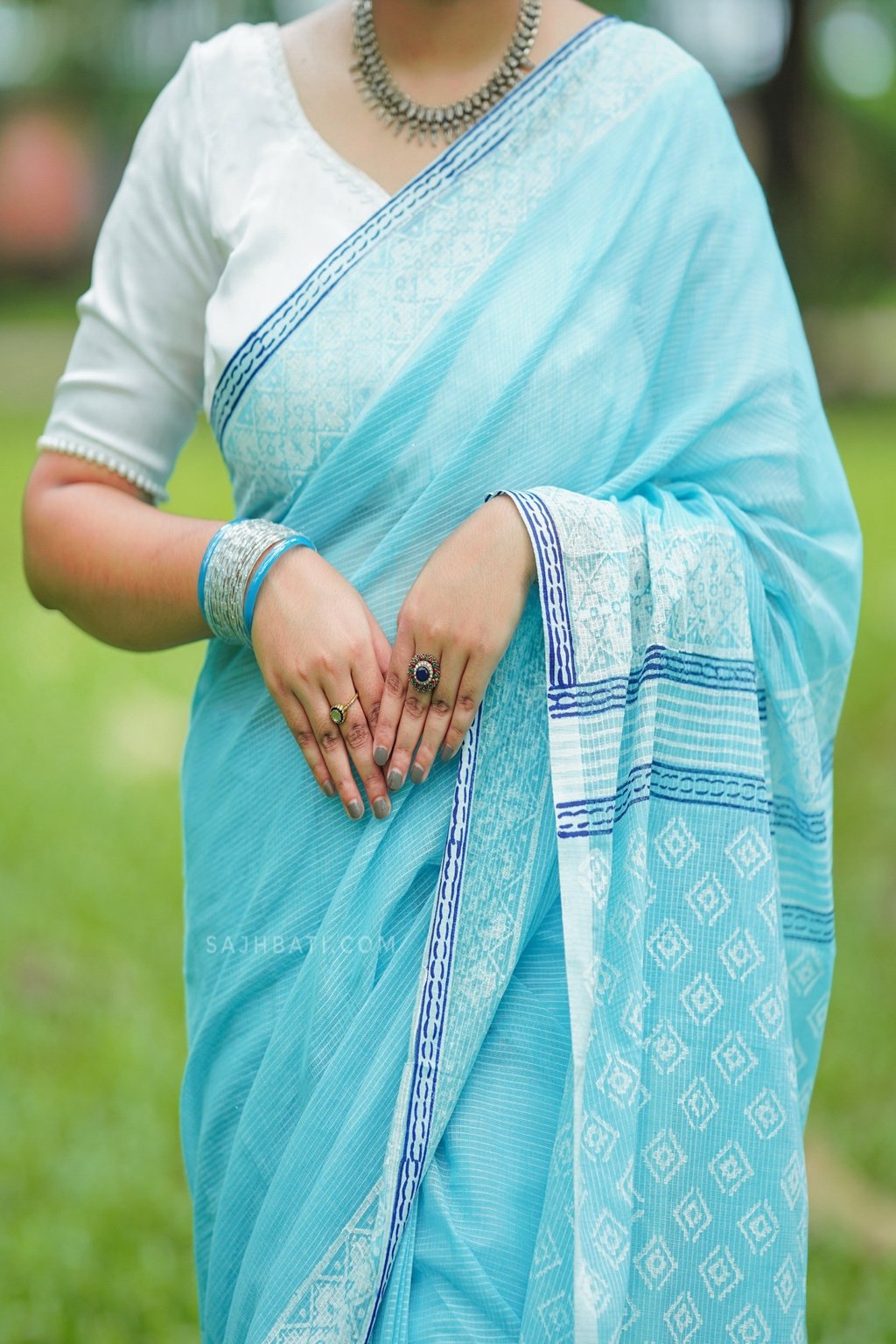নীলাঞ্জনা — ব্লক প্রিন্ট কোটা শাড়ি
